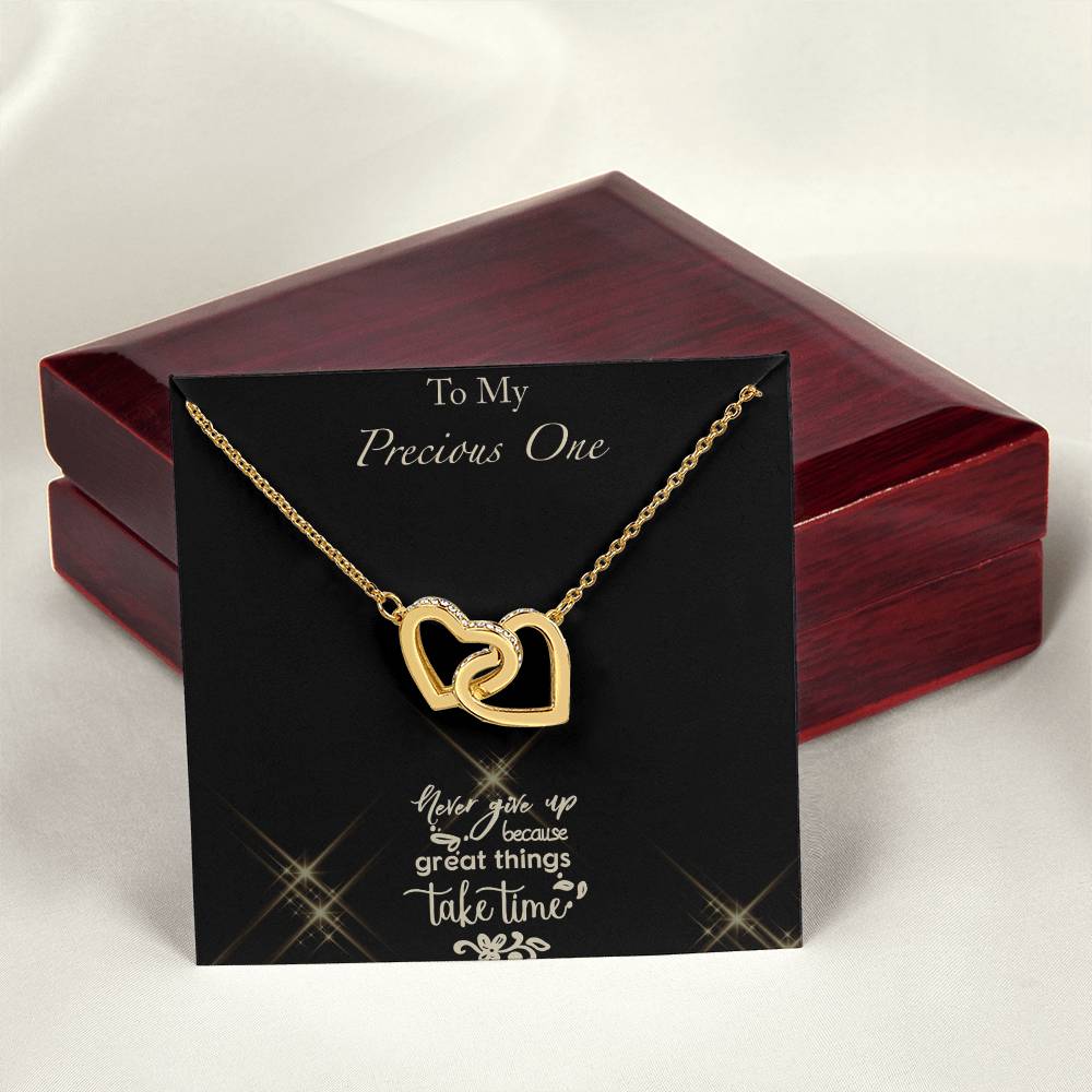 Never Give Up - Black Background Interlocking Hearts Necklace