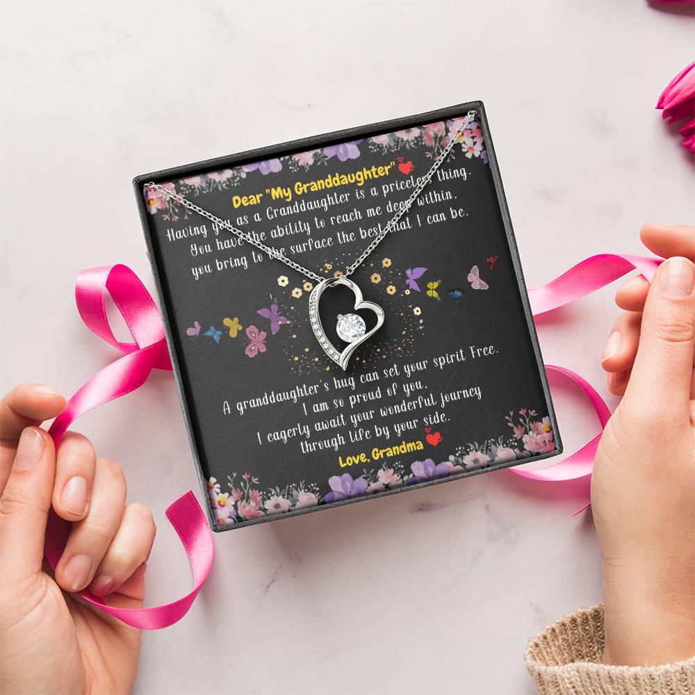 To My Granddaughter A Granddaughter’s Hug Can Set Your Spirit Free From Grandma 1 Forever Love Necklace