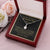 To A Beautiful Girl On Her Graduation Day -  Ribbon Necklace - Love Mom & Dad Alluring Beauty Necklace